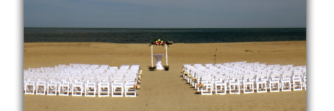 Chip Folding Chairs in a beach wedding setting Chip Folding Chairs in a beach wedding setting